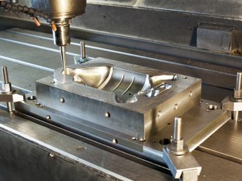 High-precision CNC milling process at Inorigin's design studio in Greece, showcasing advanced engineering capabilities for product development.