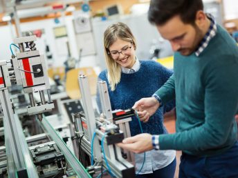 A skilled technician conducting test assembly at Inorigin's advanced engineering studio in Patra, Greece, showcasing innovative product design processes.